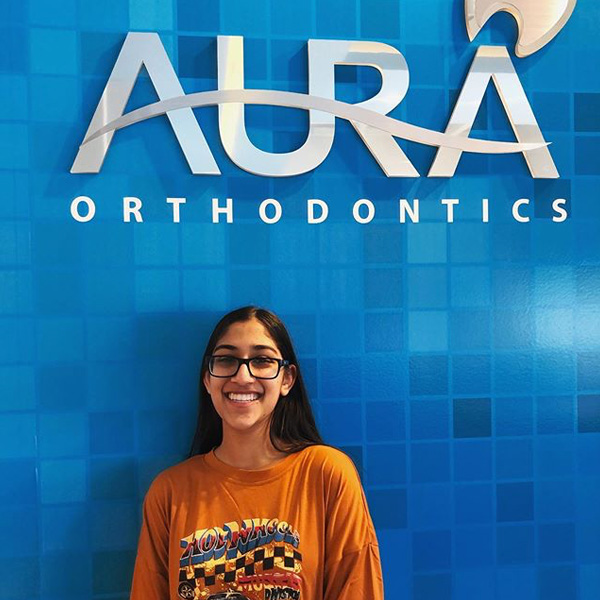 smiling Girl with Aura orthodontics wall1